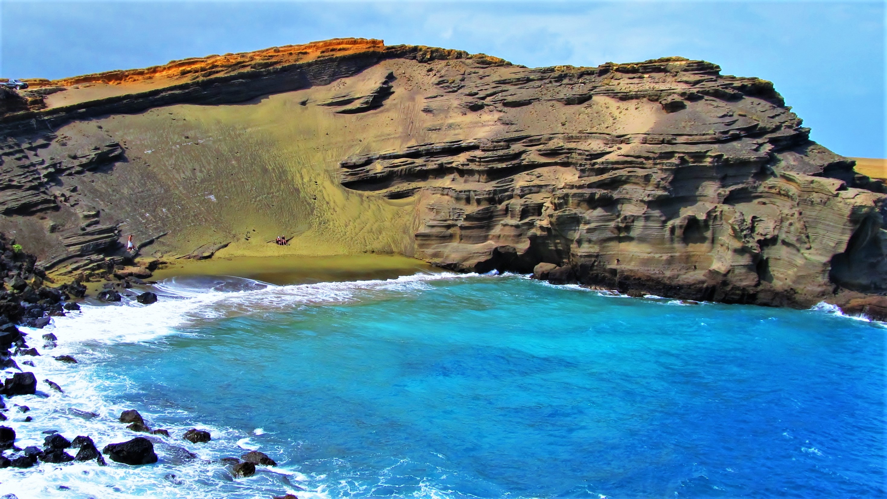 Papakolea Green Sand Beach - one of many unique Hawaii attractions