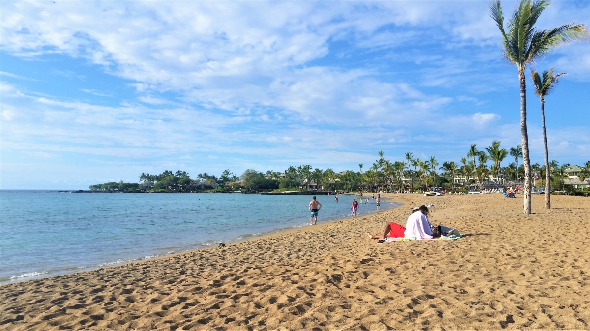 Relaxing on the beach at Anaeho'omalu Bay
