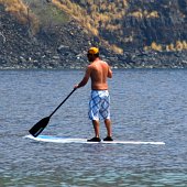 The calm bays on the Big Island make this a perfect place to learn stand up paddle boarding.