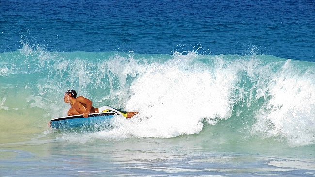 Kua Bay boogie boarding at Manini'owali Beach